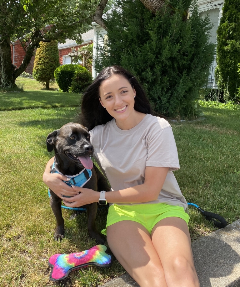 Julia Sampaio, RIC nursing senior and her beloved dog, Bella