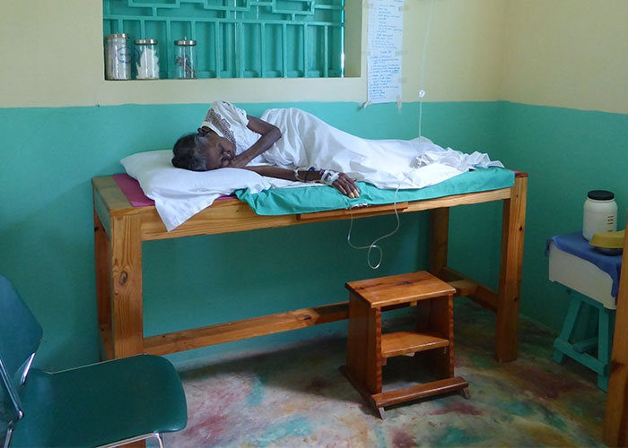 Woman lays on her side on the examination table