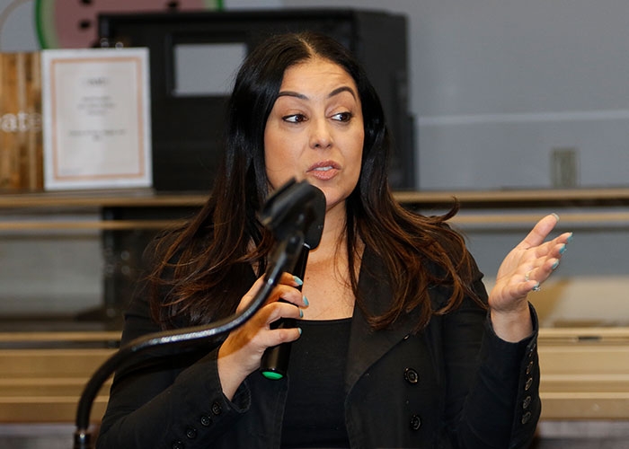 Central Falls guidance counselor congratulates students on their academic achievements