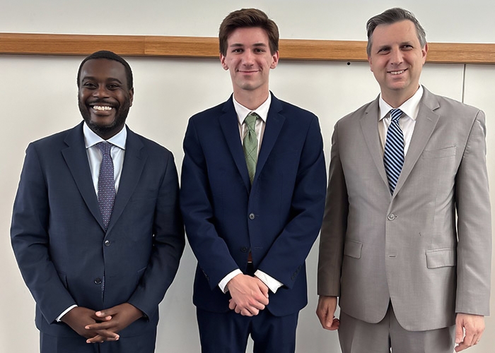 Dante DiGregorio, Rep. Gabe Amo and Rep. Seth Magaziner at RIC 