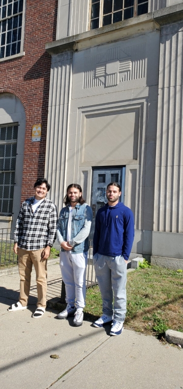 Calixto, Juan and Roy in front of the Verizon Building