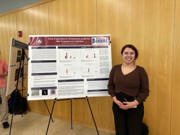 Student presenting poster