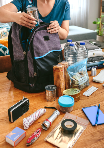 Person packing emergency kit