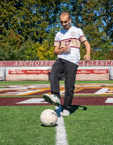 Joe Kelly, soccer player, kicking the ball around 