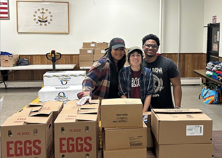 Modern Languages students serving the community at the Central Fall's food pantry