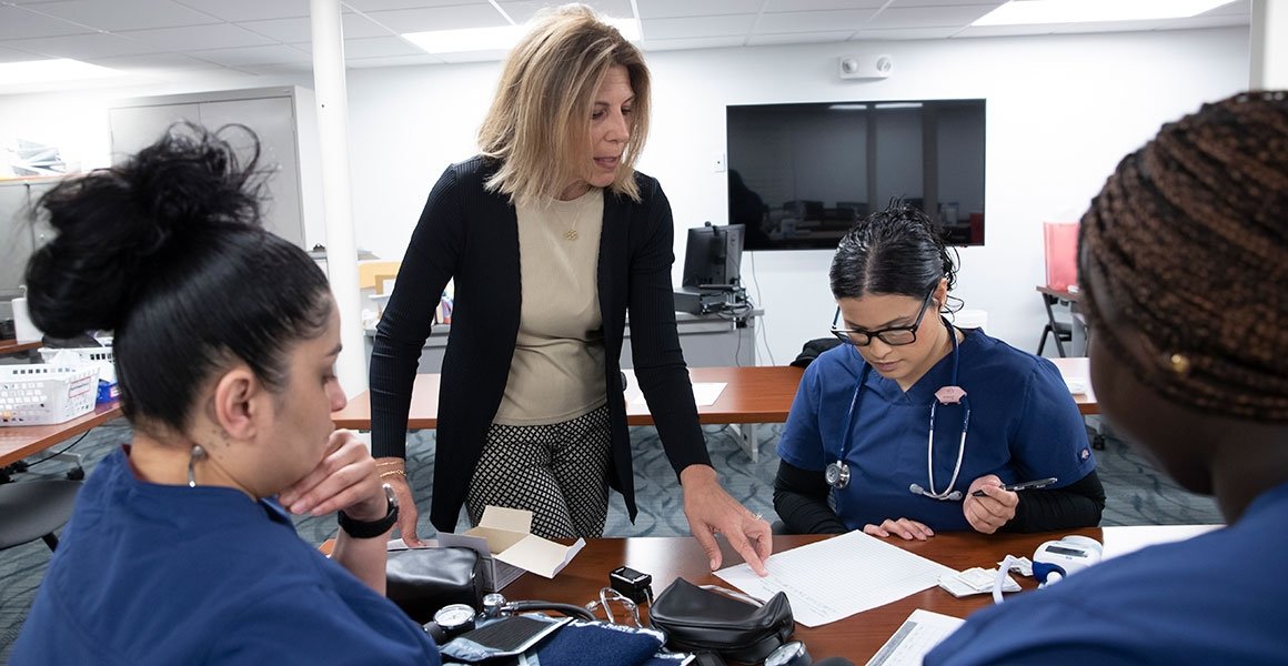 Workforce medical training, instructor with three students