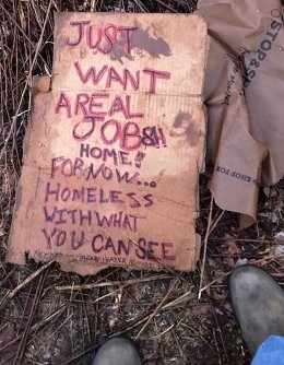 Homelessness -- a sign requesting a job