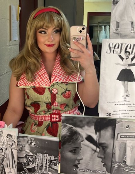 Olivia Lancellotta sits in dressing room in full costume