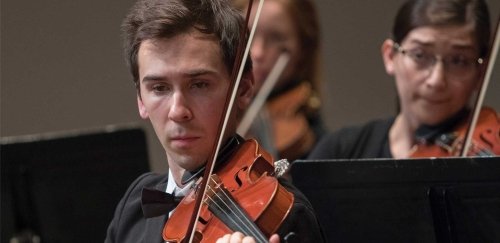 Violin musician in RIC Symphony Orchestra