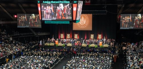 Undergraduate commencement ceremony, wide view of Amica Mutual Pavilion audience