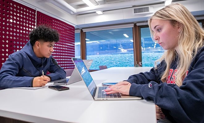 Students working on laptops